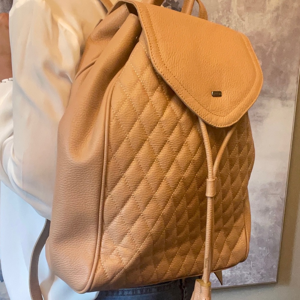 Brazilian leather tan backpack.
